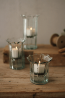 Set of three recycled glass candle holders for tabletop display
