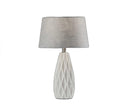 Luxury bedroom décor featuring 23-inch white ceramic lamps