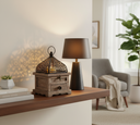Rustic lantern on coffee table with glowing candle
