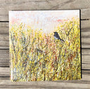 Handcrafted ceramic tile with sparrow and wildflower design