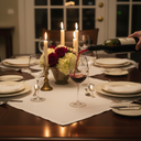 Wine Aerator Pourer Set on a bottle of red wine being poured into a crystal glass at a beautifully set dinner table