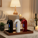 Electric wine aerator on modern home bar background.